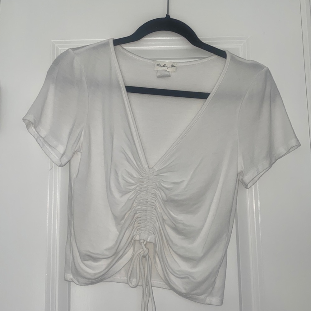 White v neck shirt